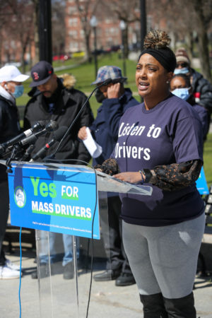 Supporters of app-based driver flexibility and benefits gather at Boston Common, in front of the Massachusetts State House, on March 30, 2022.